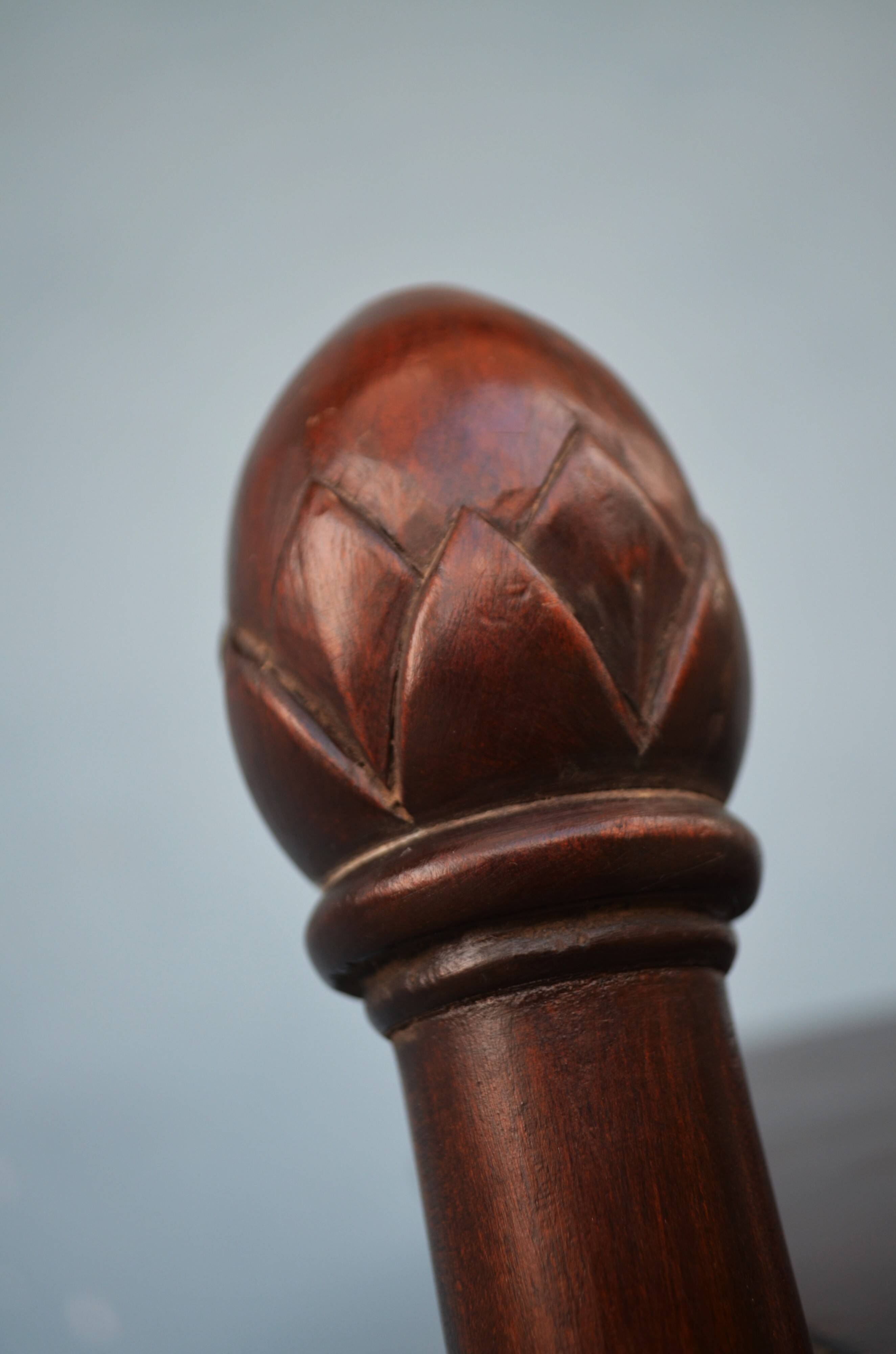 Spiral staircase for library made of mahogany wood
