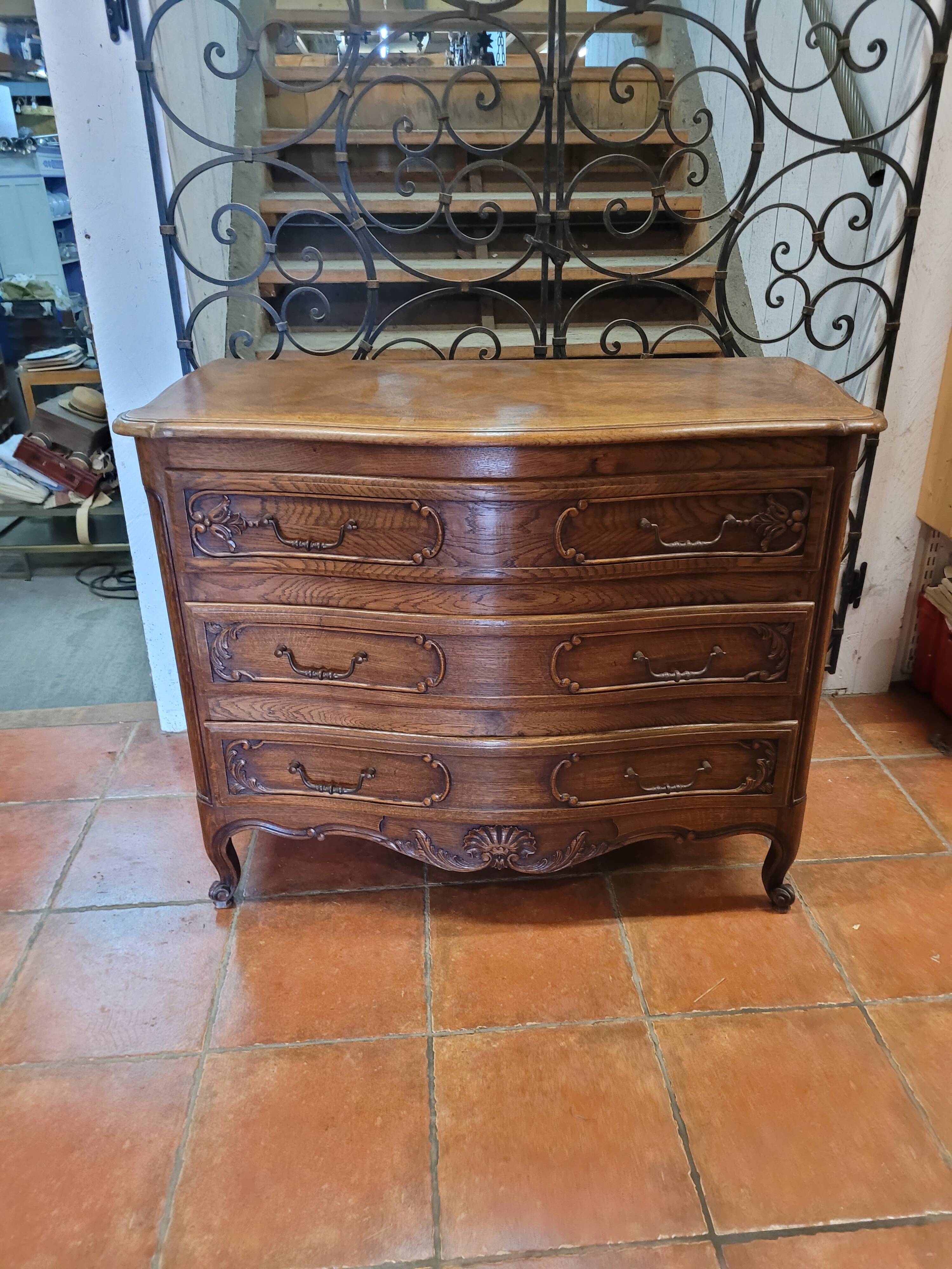 Curved oak chest of drawers in Louis XV style