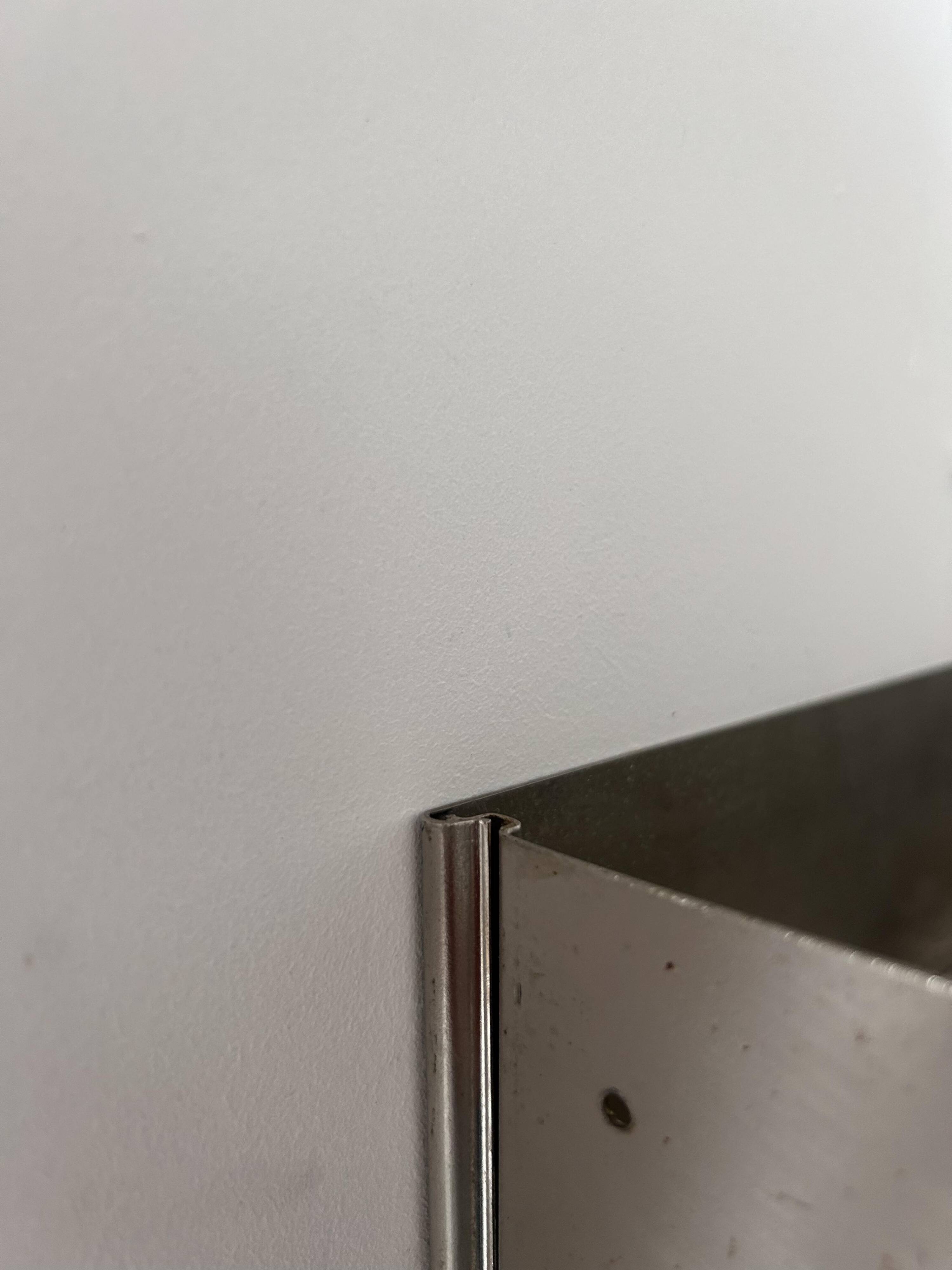 Vintage modernist wall lamp, folded metal, France 1970