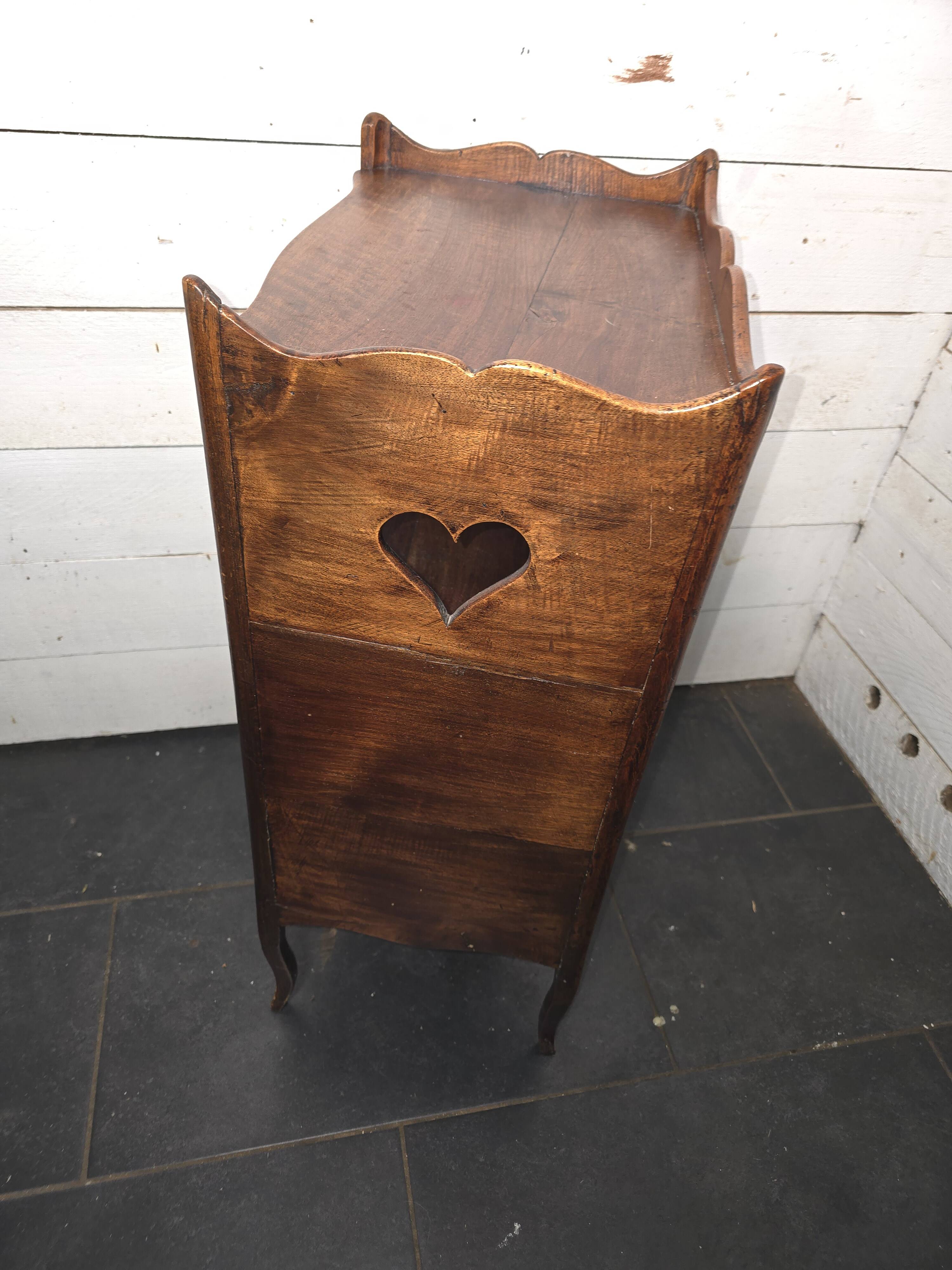 Open library in Louis XV style made of walnut.