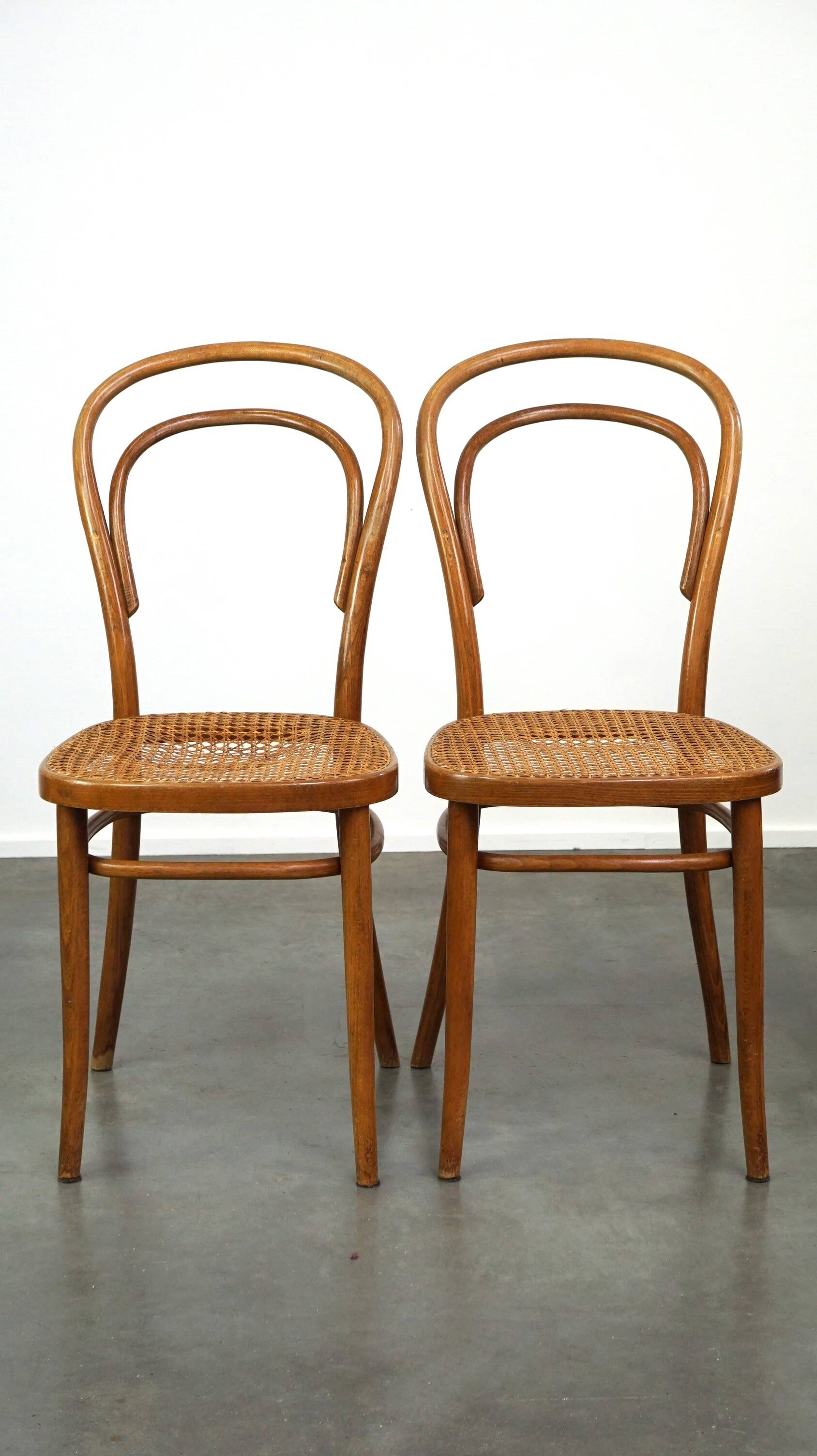 Lovely set of 2 brown vintage bistro chairs with woven seats