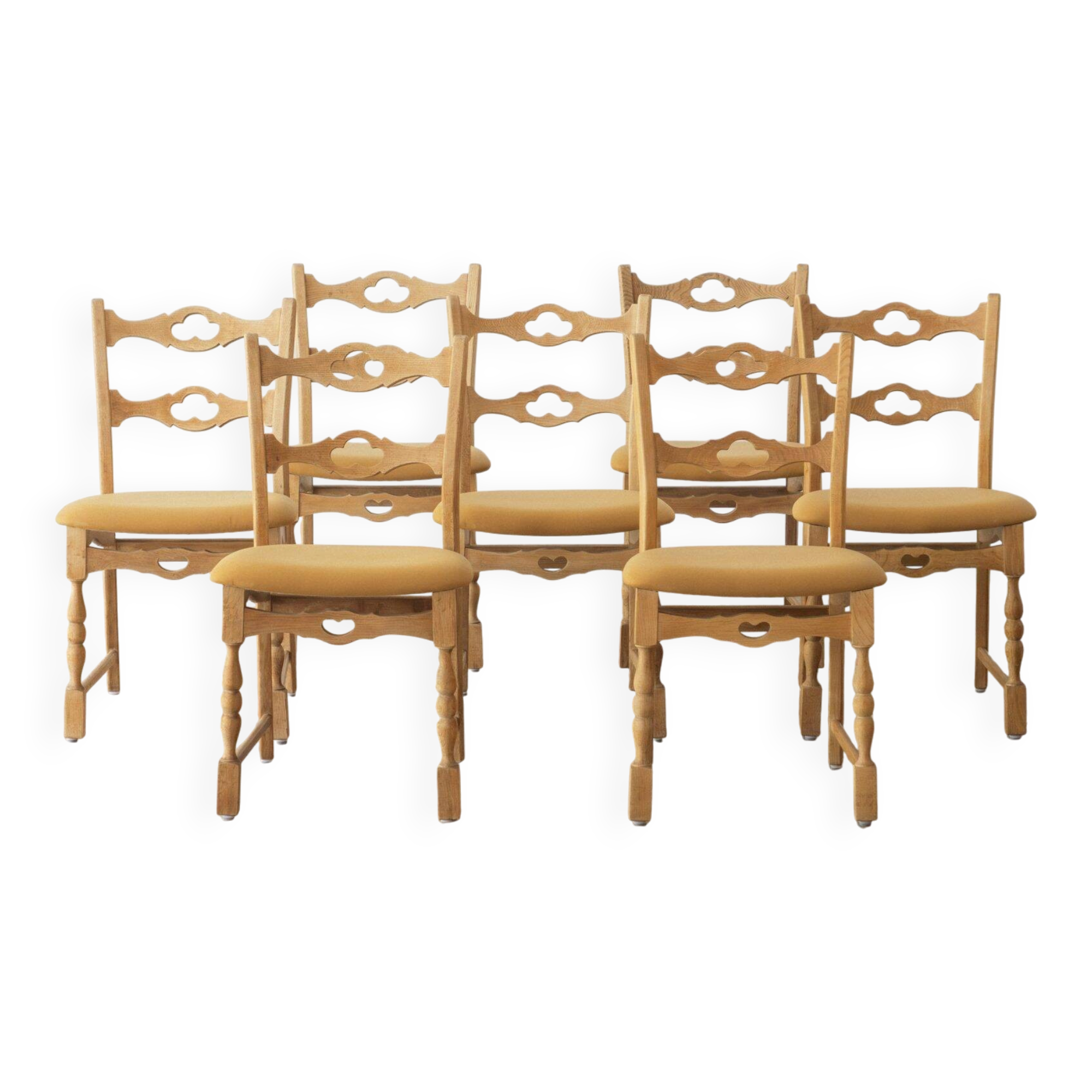 7 chaises de salle à manger Henning Kjærnulf