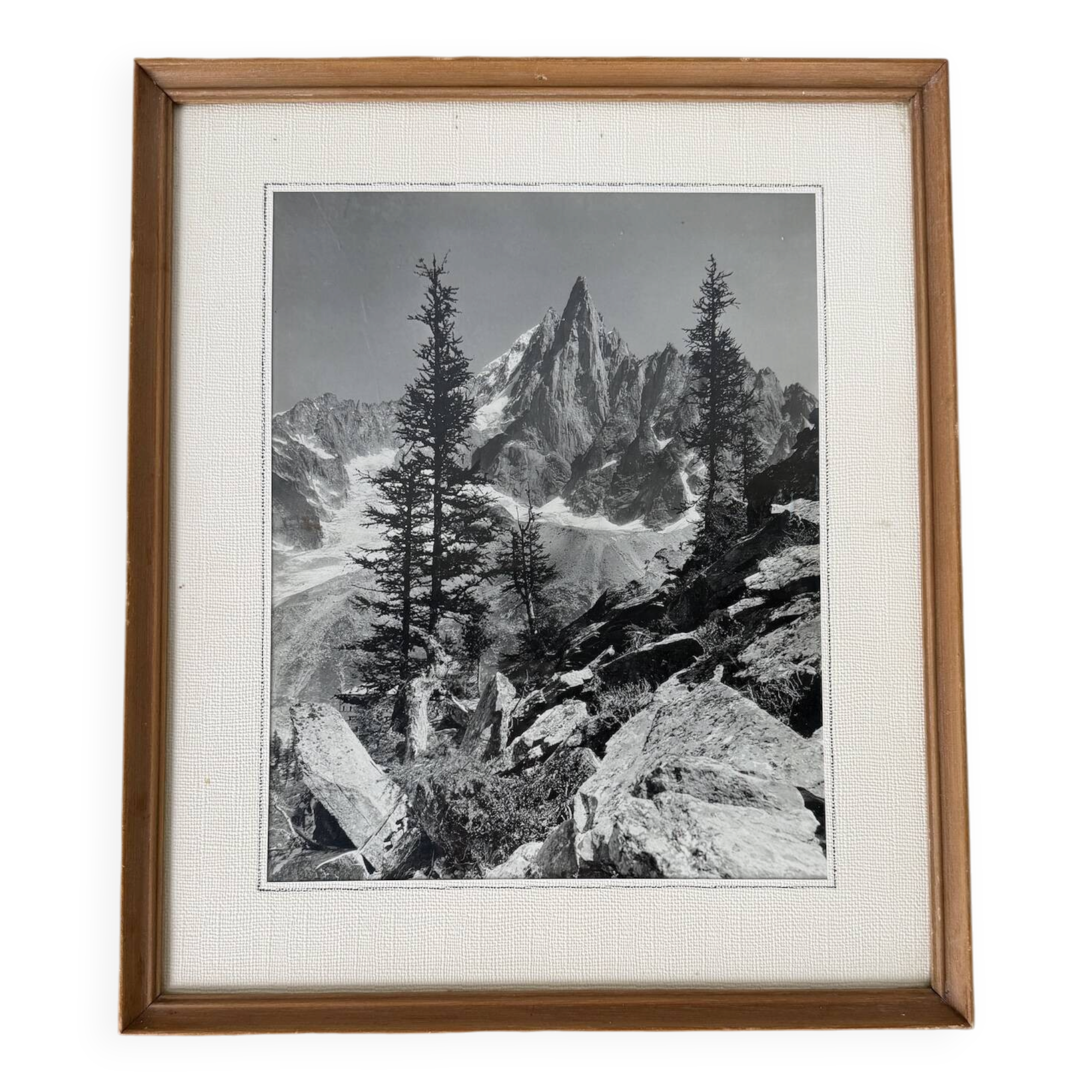 Framed old photo of a mountain landscape.