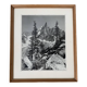 Framed old photo of a mountain landscape.