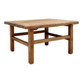 Table basse brutaliste en bois massif