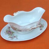 Sauce boat on dormant white porcelain, floral decoration