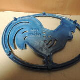 Blue cast-glass flat underside rooster pattern