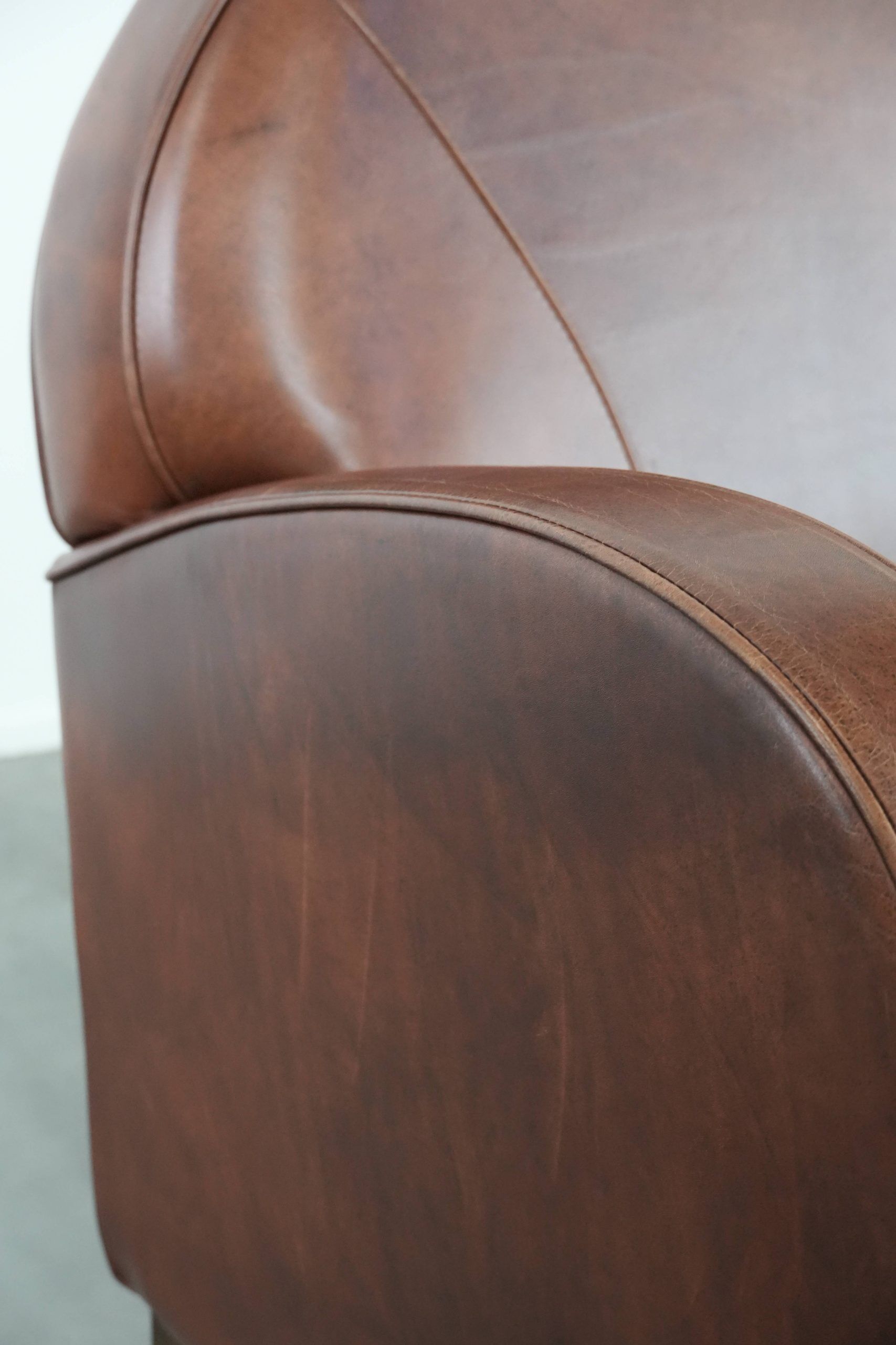 Beautiful art deco design armchair made of cowhide leather in English style