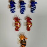 Six small Murano Seahorses in glass.