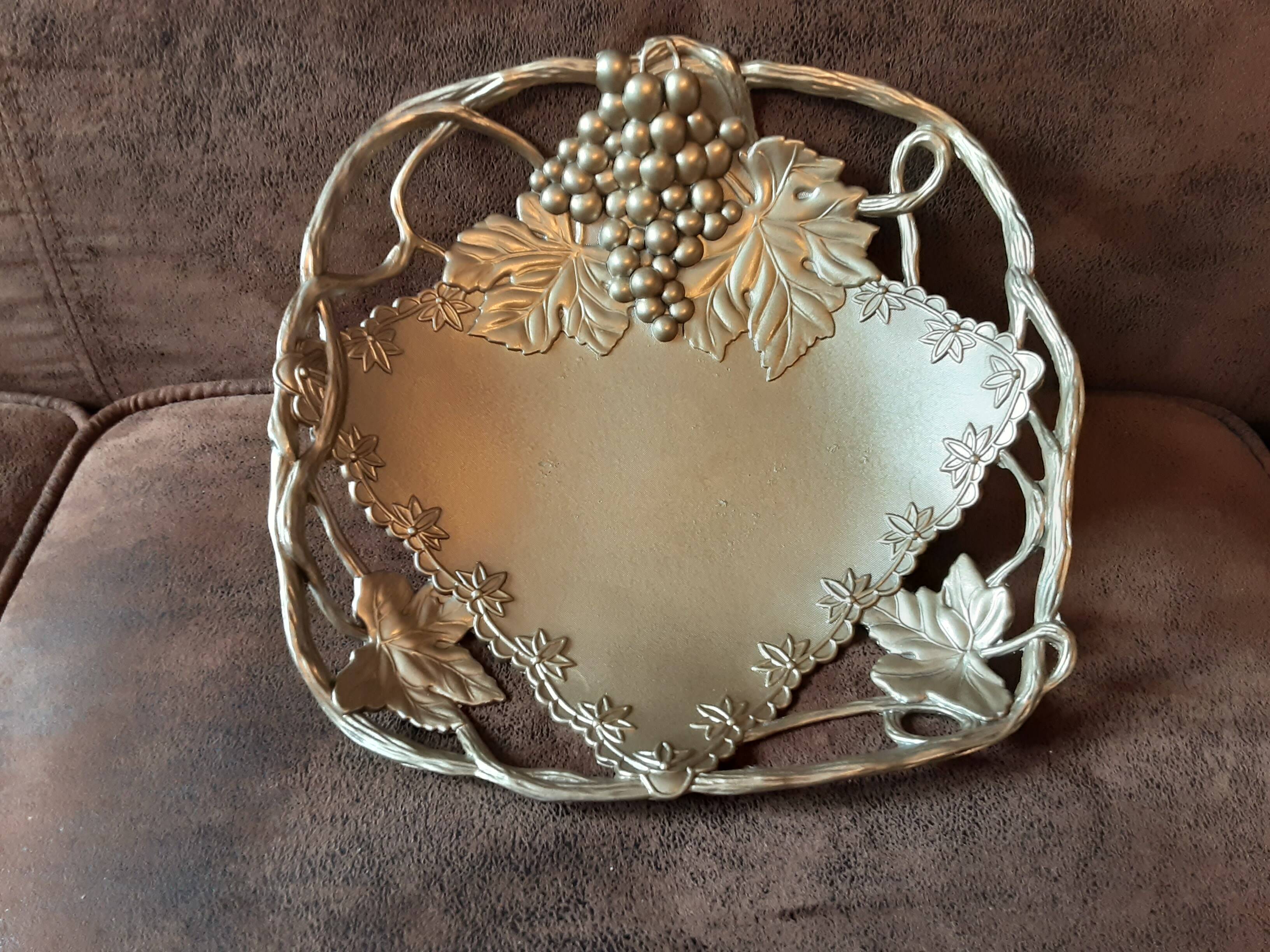 Metal basket with vine decor