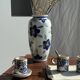 Vase white background stylized blue, yellow and green flowers H24.5 D12
