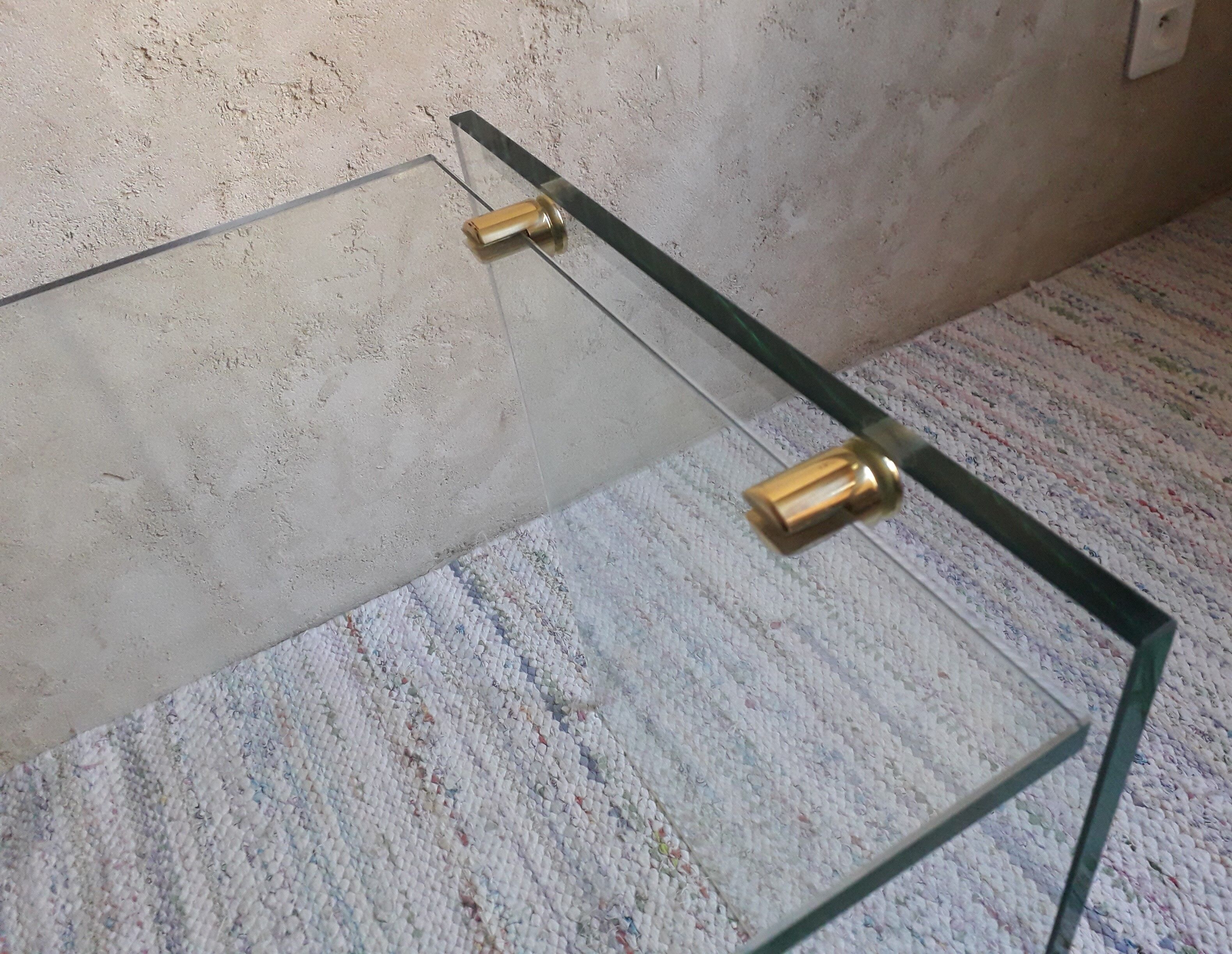 Glass and brass coffee table