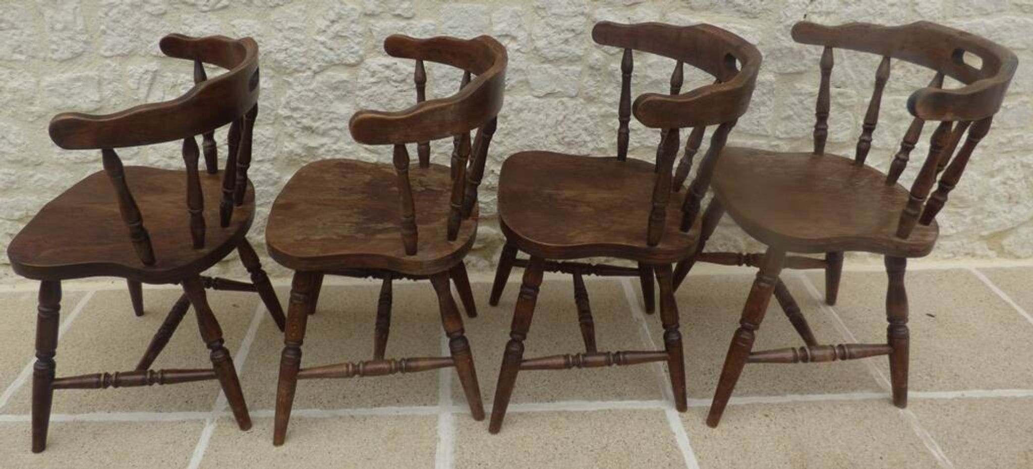4 solid wood chairs in western style called "smockers chairs", in oak.