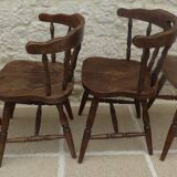 4 solid wood western-style "smoker's chairs" made of oak