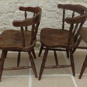 4 solid wood chairs in western style called "smockers chairs", in oak.