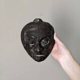 Ancient Indonesian bronze mask antique ethnic decoration tribal theater