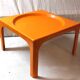 Orange fiberglass coffee table - 70s