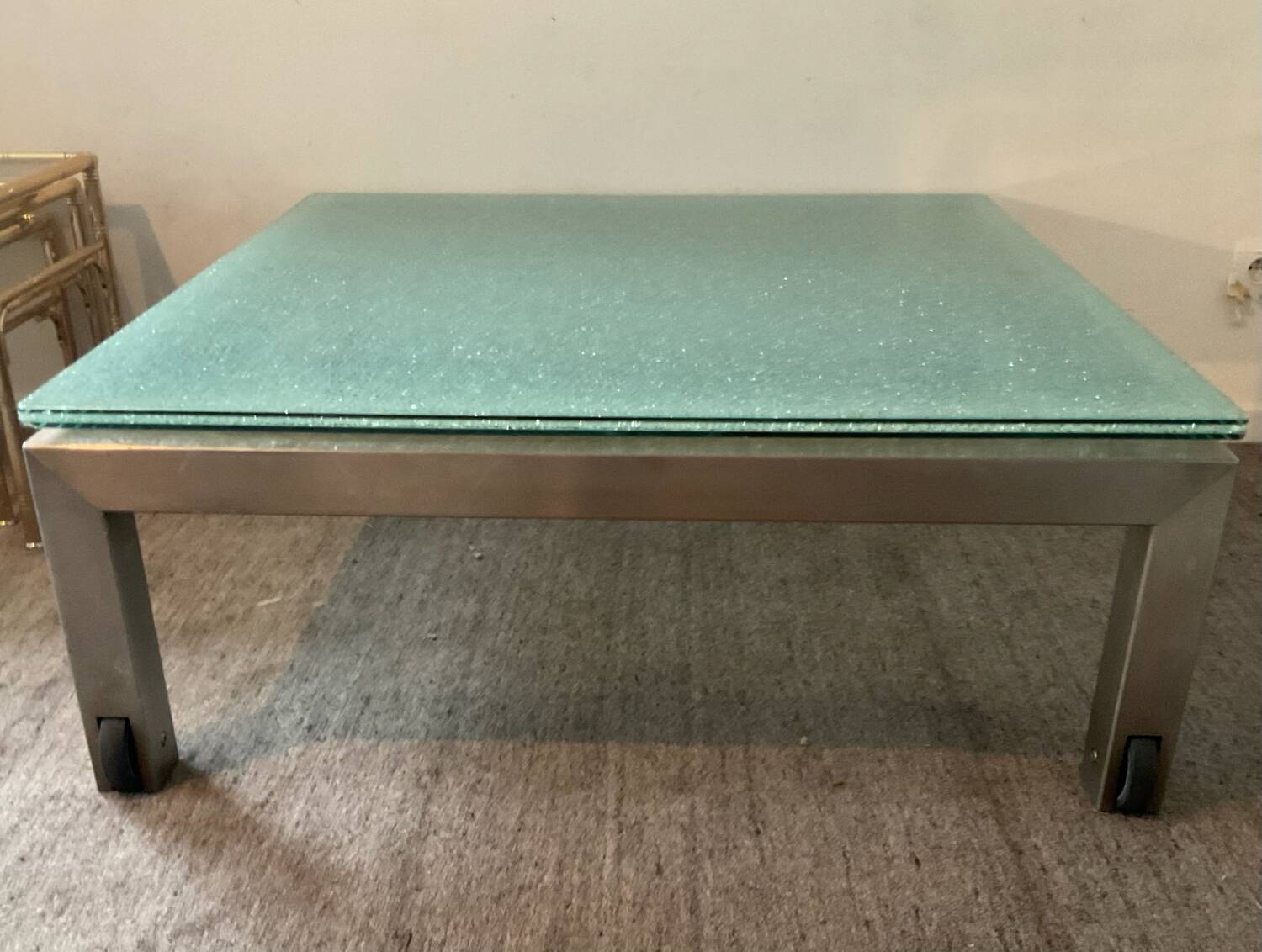 Designer garden coffee table in tempered glass and stainless steel