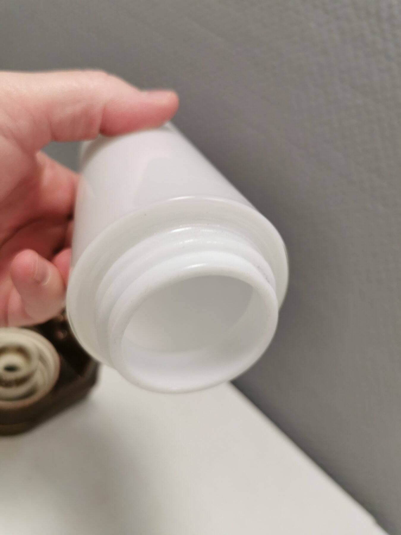 Ceramic bathroom lamp designed by Sigvard Bernadotte for IFÖ Sweden.