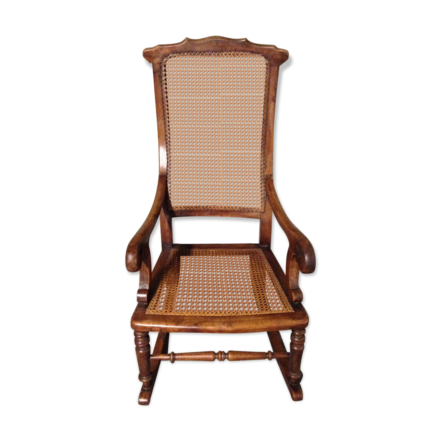 Rocking-chair en bois de cannage