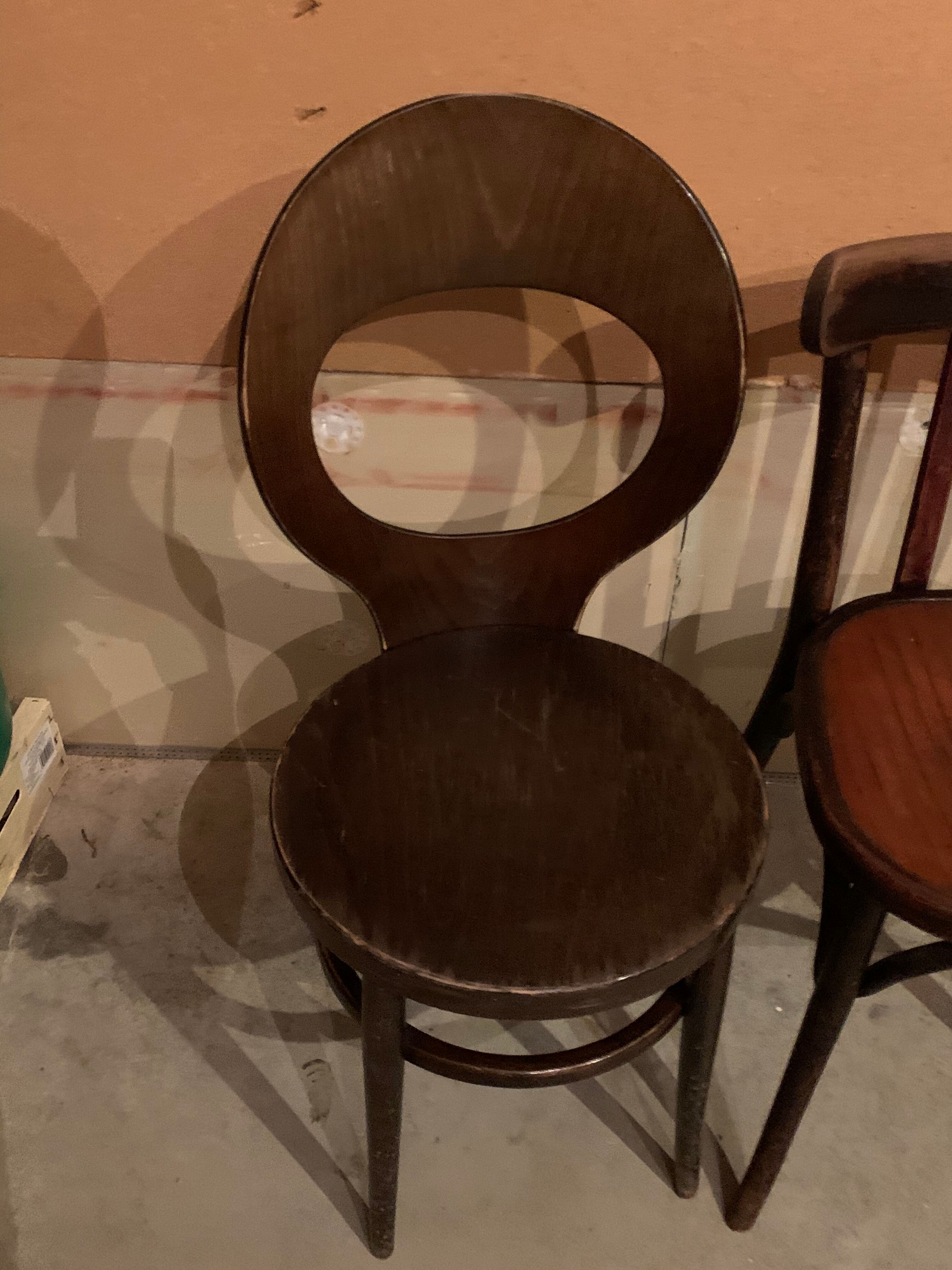 Lot of mismatched bistro chairs