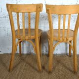 Pair of Baumann type bistro chairs stamped PTT