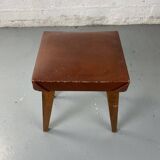 Small stool or footrest in wood and leather