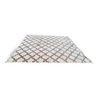 Tapis blanc cassé