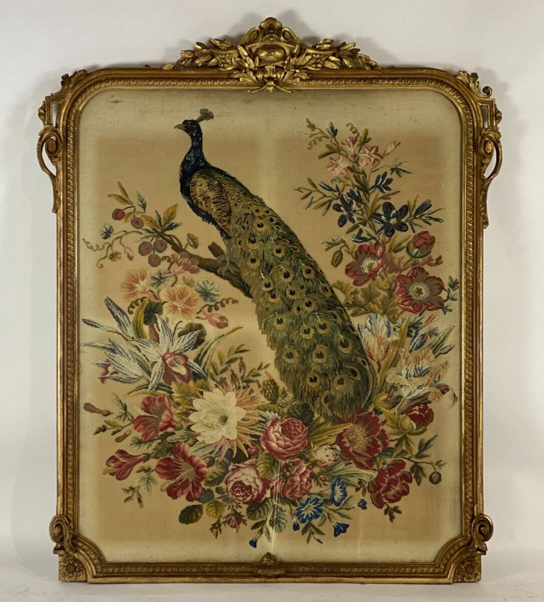 Cross-stitch tapestry in a Louis XVI style frame from around 1900.
