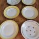 Vintage mismatched yellow and gold soup plates