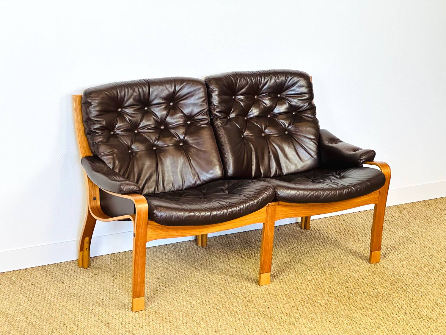 Scandinavian leather and teak bench from the 1960s.