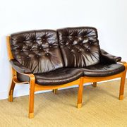 Scandinavian leather and teak bench from the 1960s.
