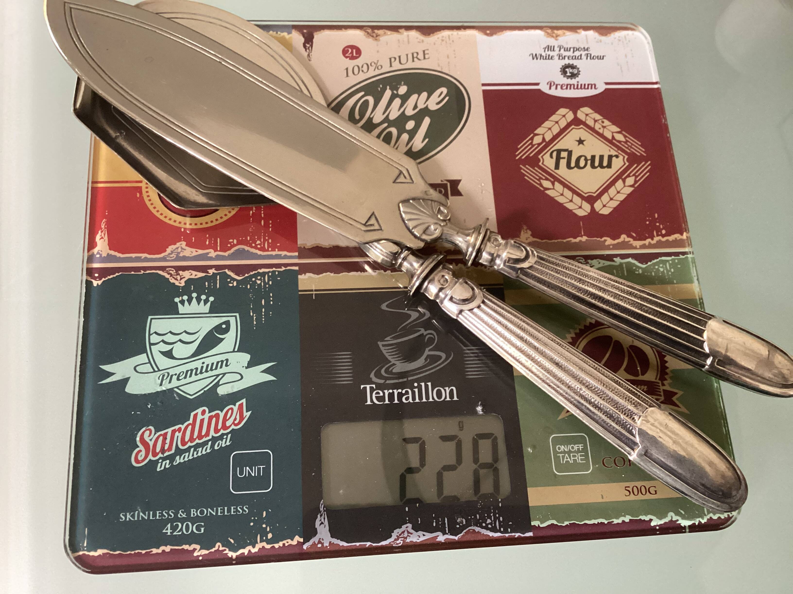 Antique silver serving cutlery with a Minerva hallmark.