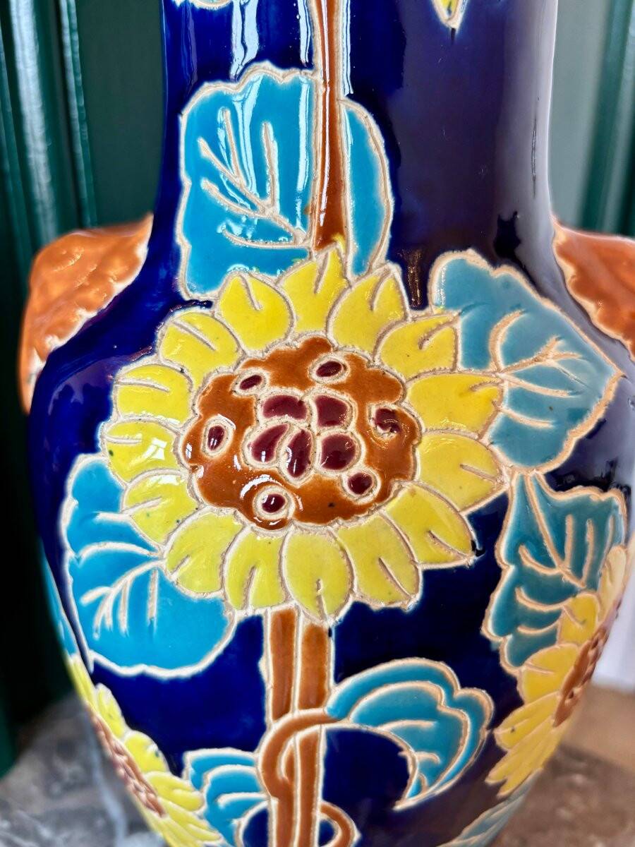 Ceramic vase with sunflowers