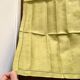Old embroidered green square table napkin with cutwork