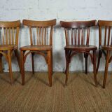4 mismatched signed bistro chairs