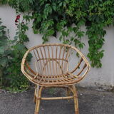 Rattan basket armchair.