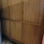 Large pine bookcase with three doors, fitted with frosted glass.