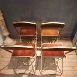 Set of four folding metal and velvet chairs
