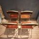 Set of four folding metal and velvet chairs