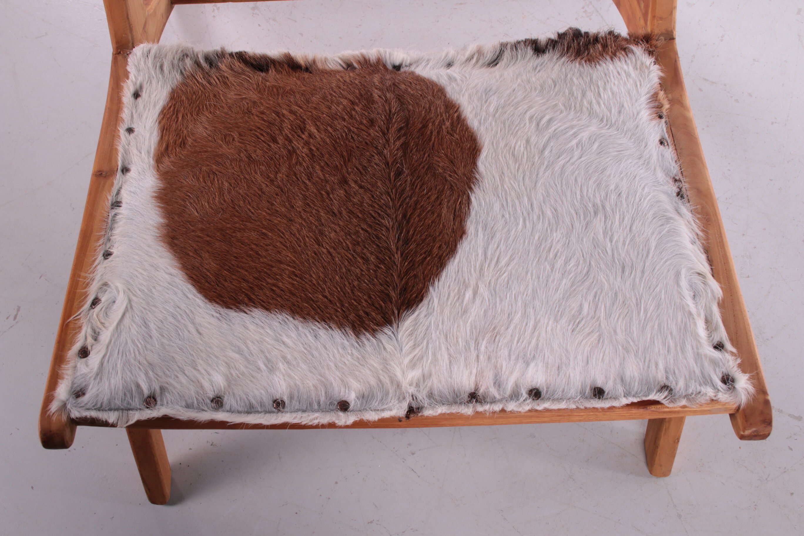 Vintage Relax chair upholstered with cowhide, 1970