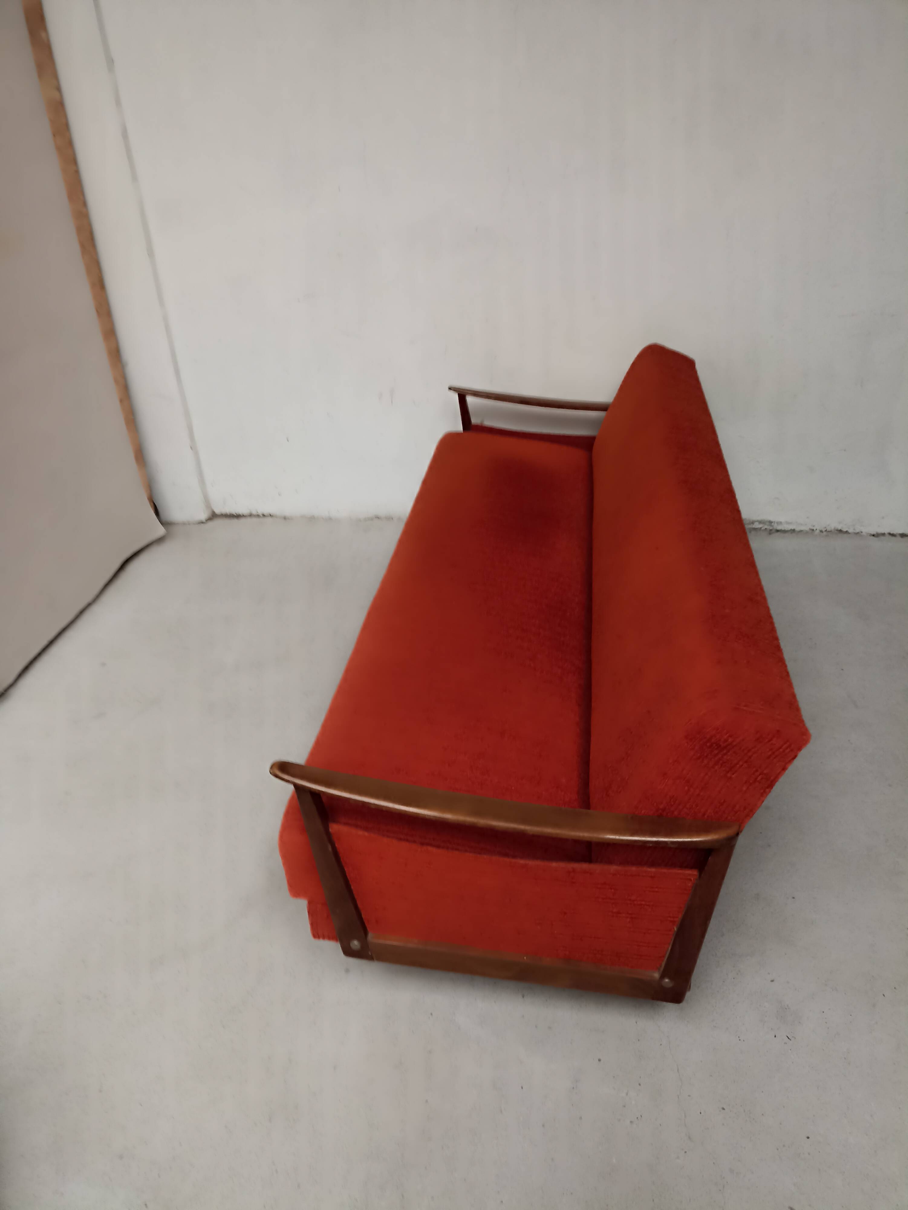 Vintage orange convertible sofa