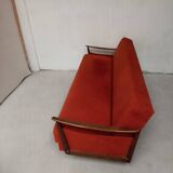 Vintage orange convertible sofa
