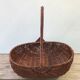 Former collection in braided wicker rattan with cove decoration vintage basket