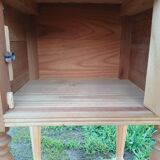 Raw wood bedside table
