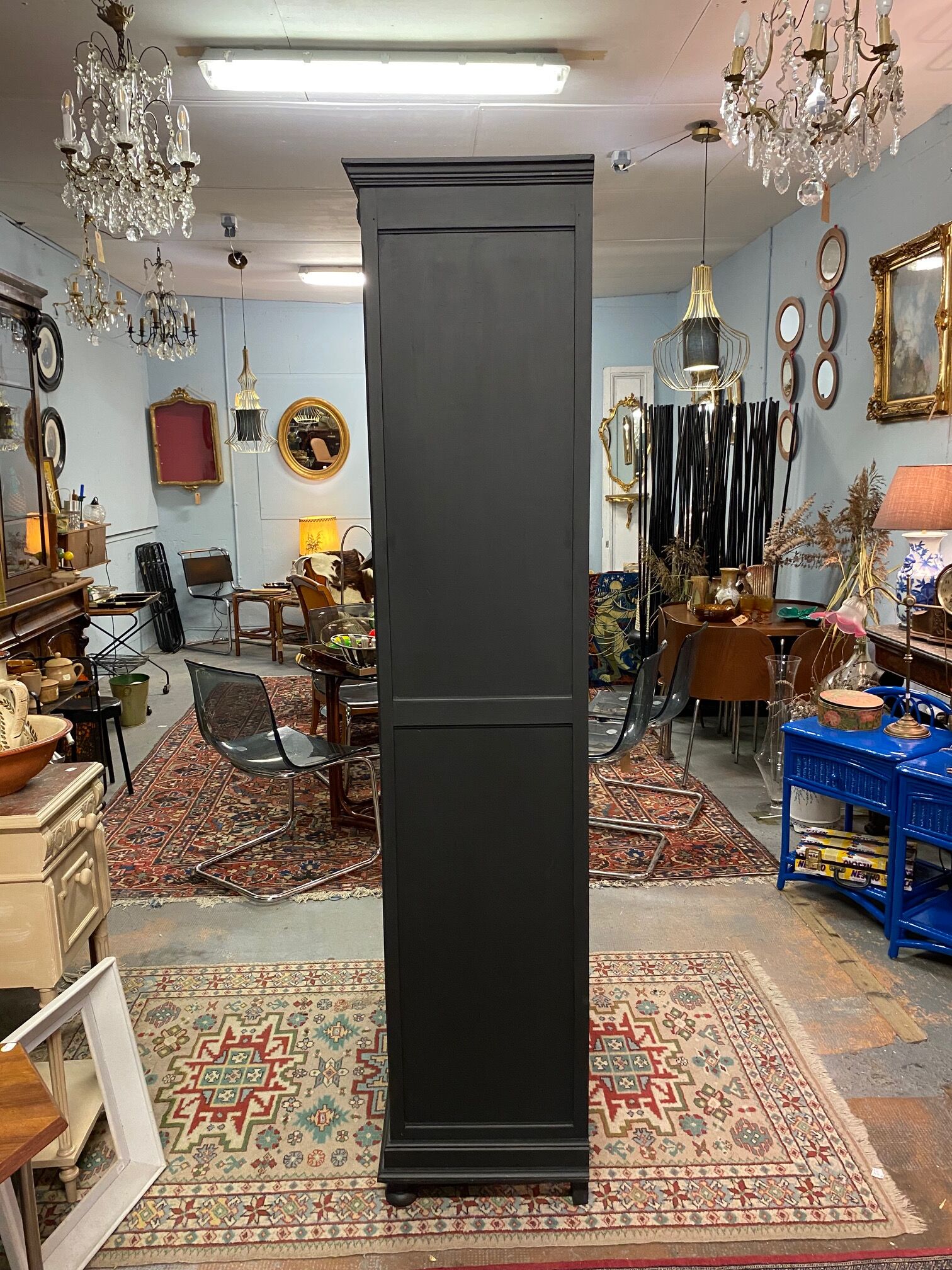 Black bookcase with glass doors