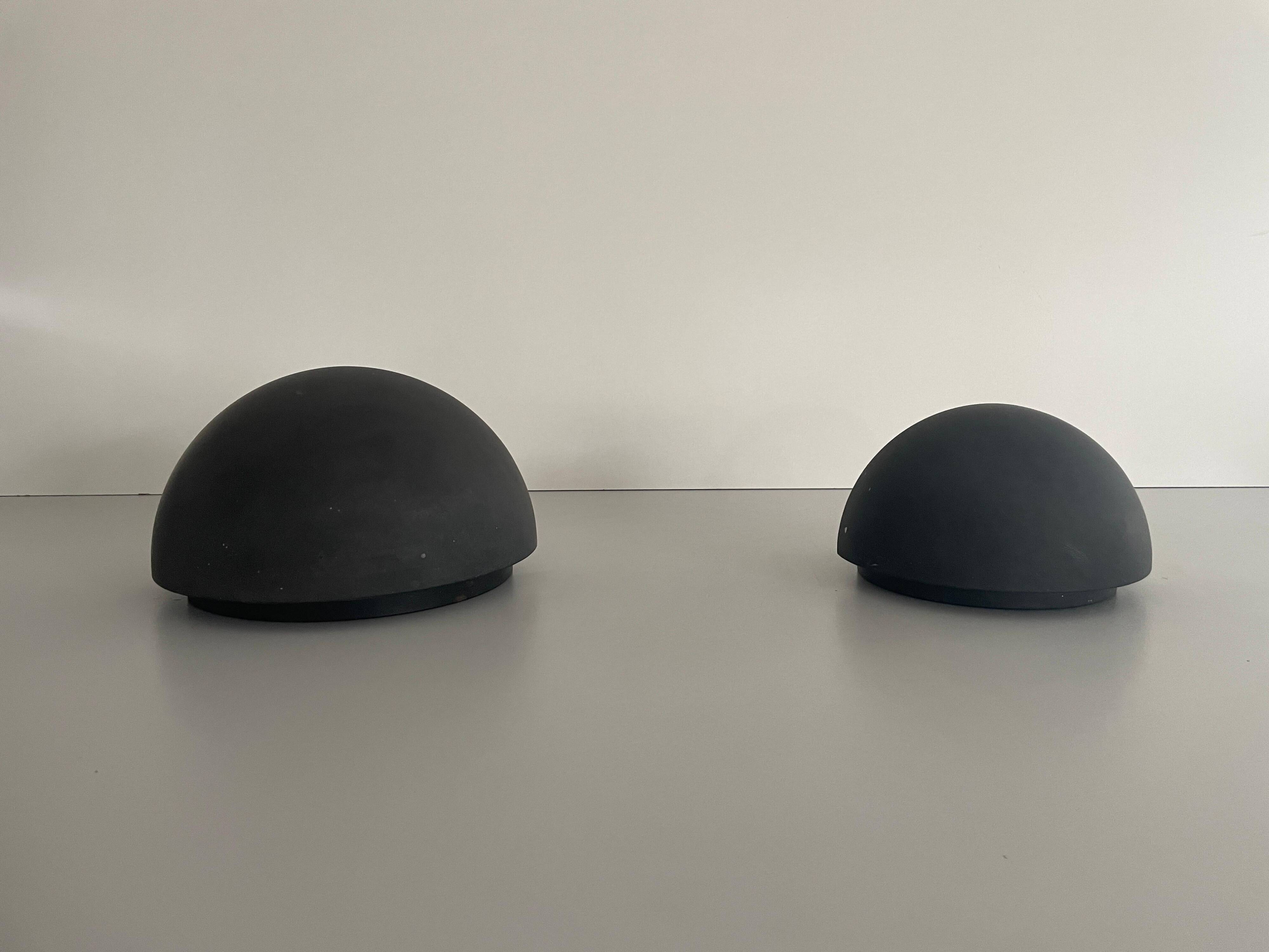 Round black metal wall lights, small and large set, by Bega, 1970s, Germany.