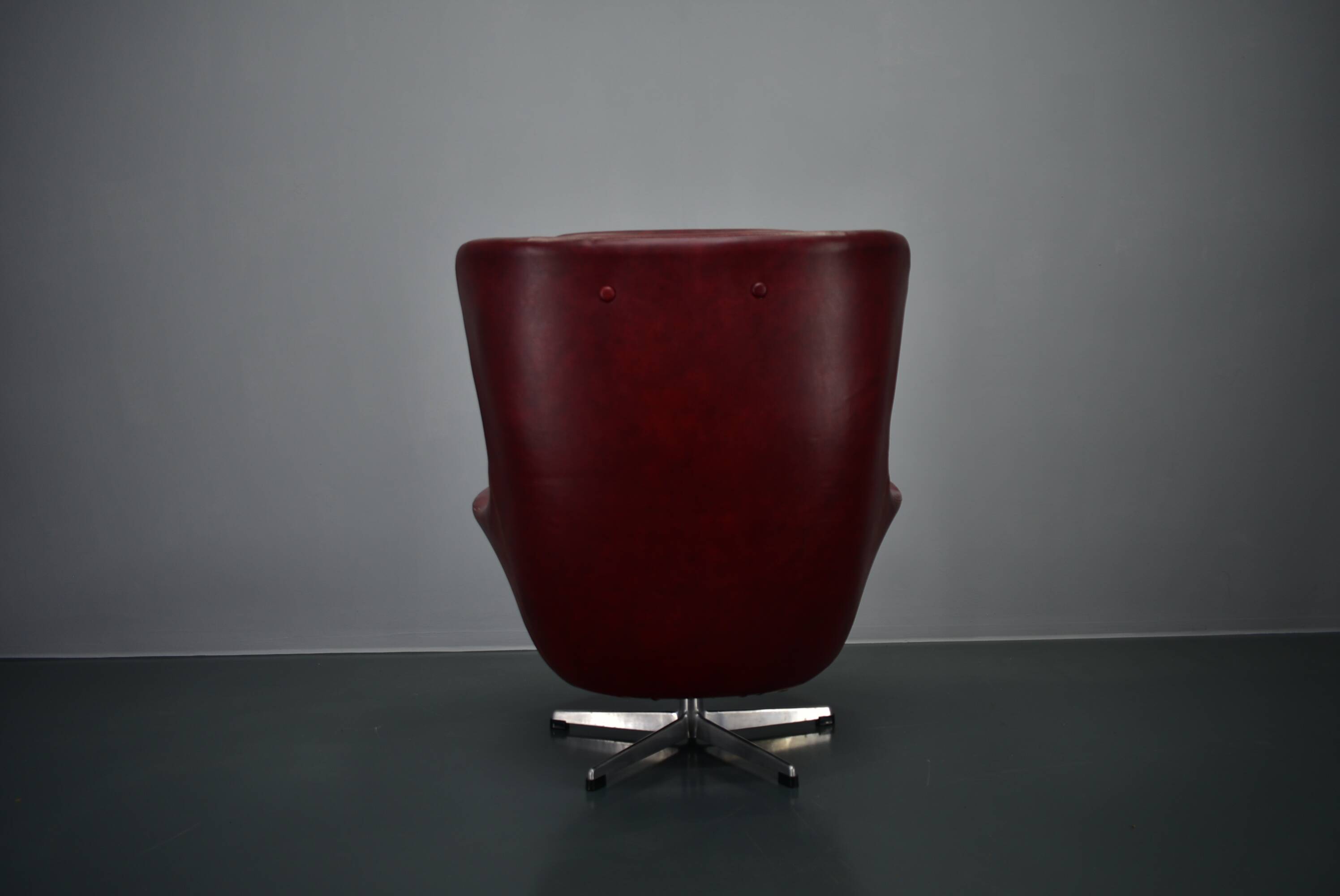 Leather swivel armchair from Up Závody , 1960s