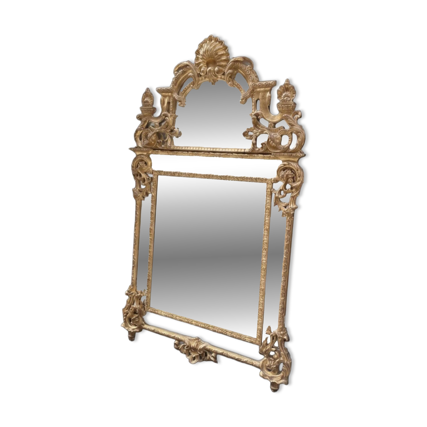 Regency style mirror in gilded wood, first half of the 19th century.