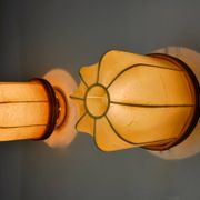 Pair of "cocoon" wall lights, resin and pine, Italy, 1970